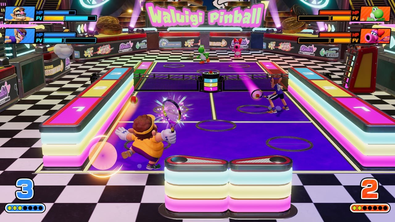 default-384 video game screenshot of Mario characters playing tennis on a large pinball table.